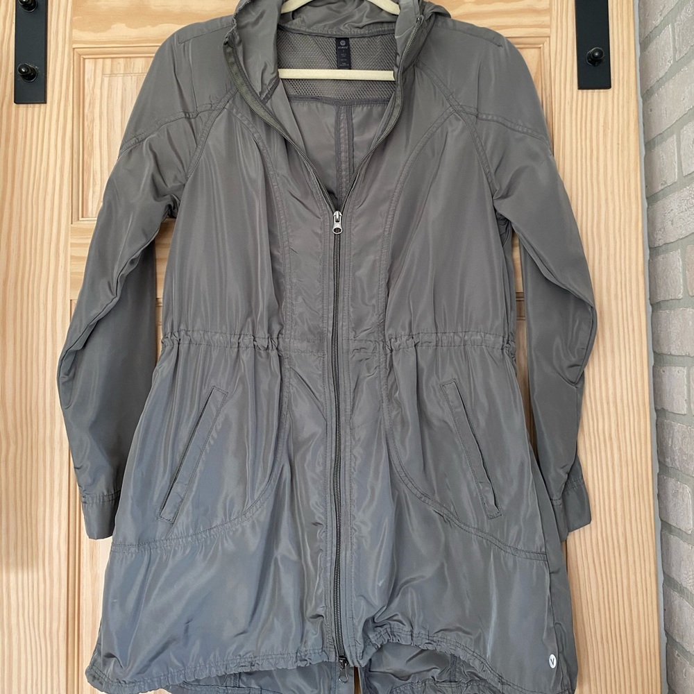 Green rain jacket adjustable waist & length